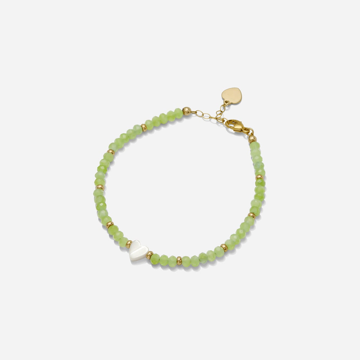 Green peridot semi precious gemstone beaded bracelet with gold fill bead accents and a dainty white pearl heart charm on a white background, handmade by Katie Dean Jewelry in Clearwater, Florida.