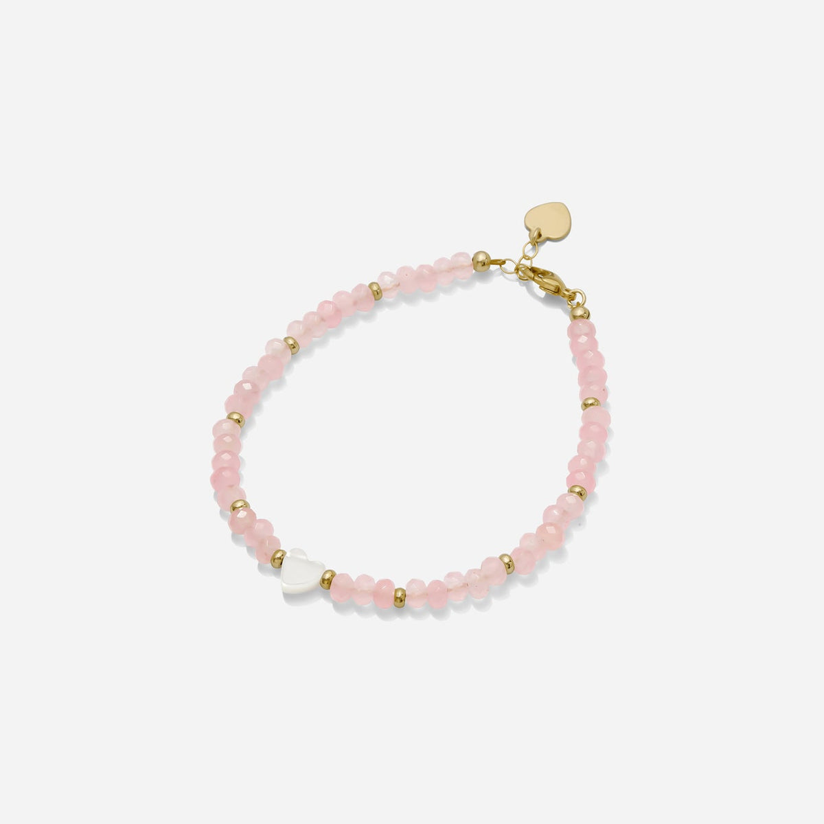 Pink semi precious gemstone beaded bracelet with gold fill bead accents and a dainty white pearl heart charm on a white background, handmade by Katie Dean Jewelry in Clearwater, Florida.