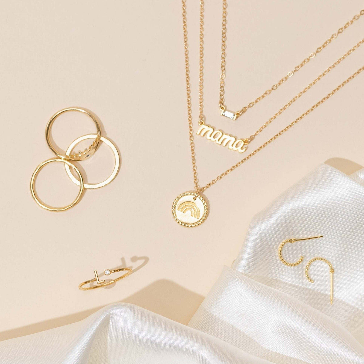 Handmade in America by Katie Dean Jewelry, dainty minimal layering Baguette, Mama, Rainbow Necklace, L Initial Ring, Beaded Hoop Studs
