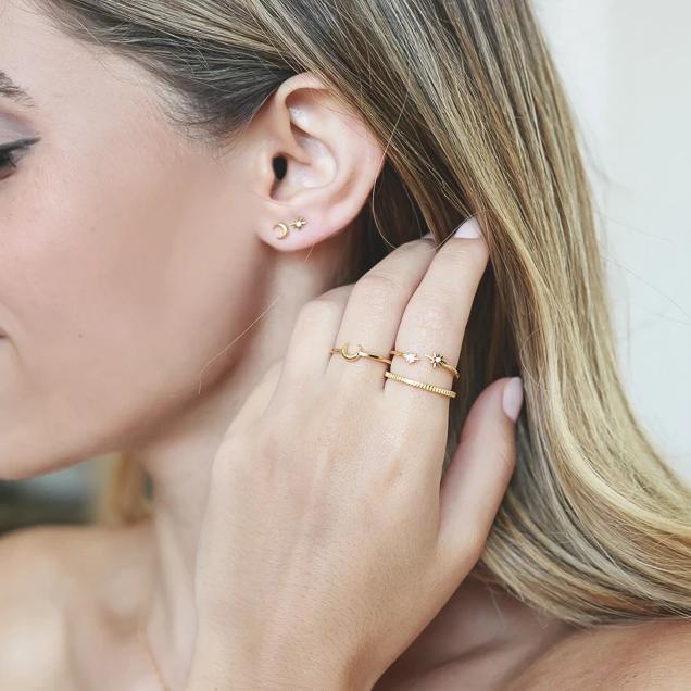 The dainty Moon Ring is worn wonderfully alone or stacked with others and adds the perfect bohemian touch to your look.