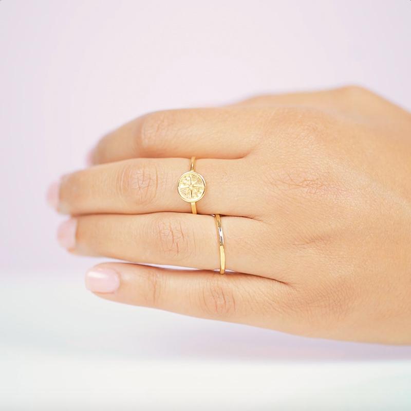 The Eight Pointed Star Ring helps guide you through life, just like a compass on a dark night at sea. Handmade in California by Katie Dean Jewelry.