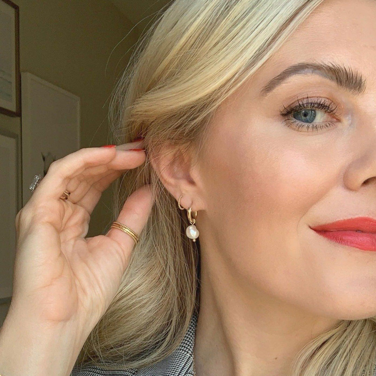 Dainty gold Pearl Hoops made by Katie Dean Jewelry in America