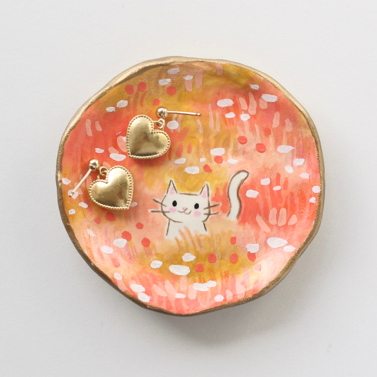 Natalie Lundeen trinket dish with Katie Dean Jewelry heart stud earrings