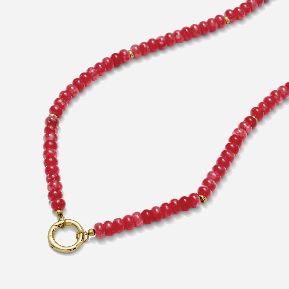 Red beaded necklace with a gold carabiner clasp on a white background handmade by Katie Dean Jewelry
