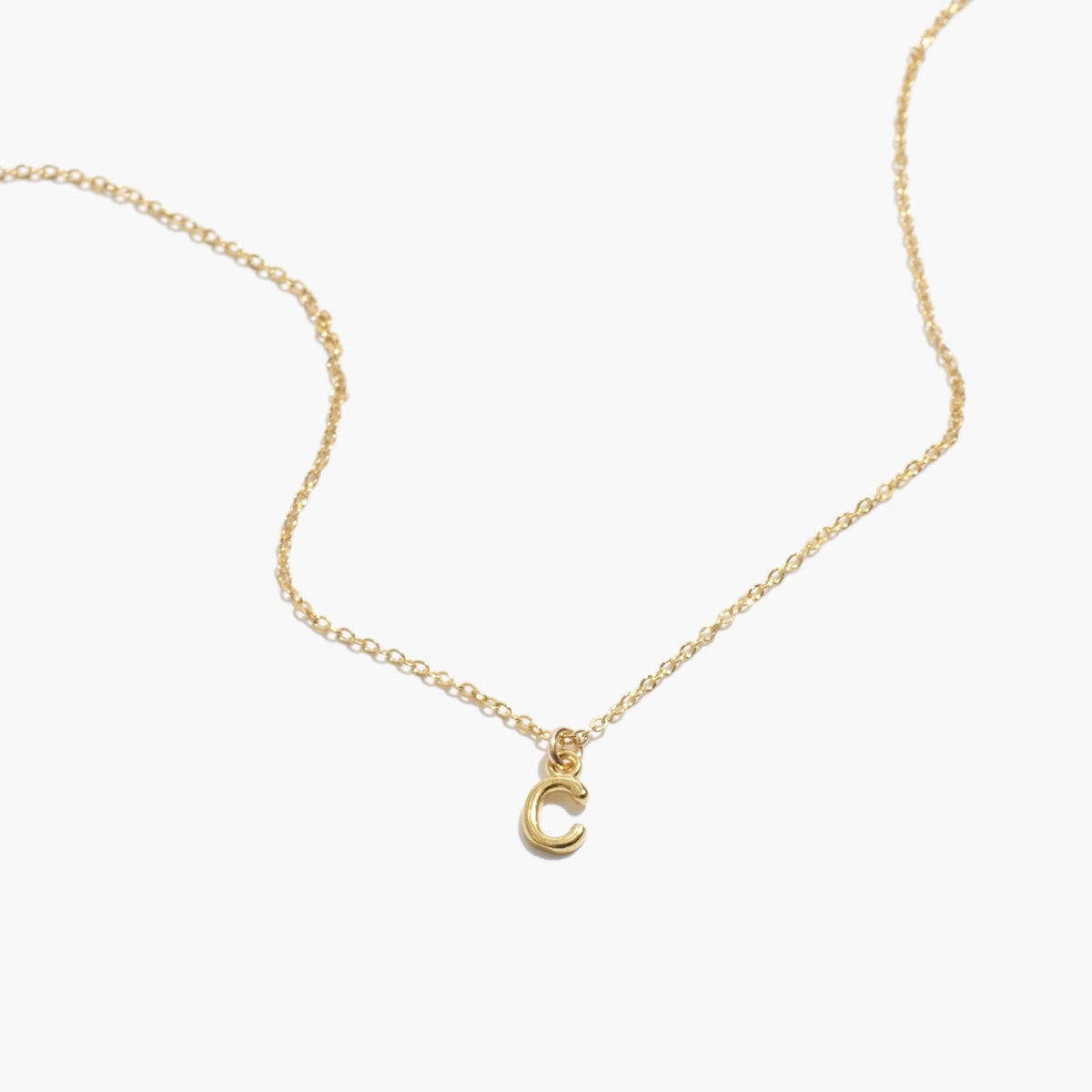 Delicate Initial Necklace, the perfect personalized piece. Minimal layering jewelry handmade in America by Katie Dean Jewelry.
