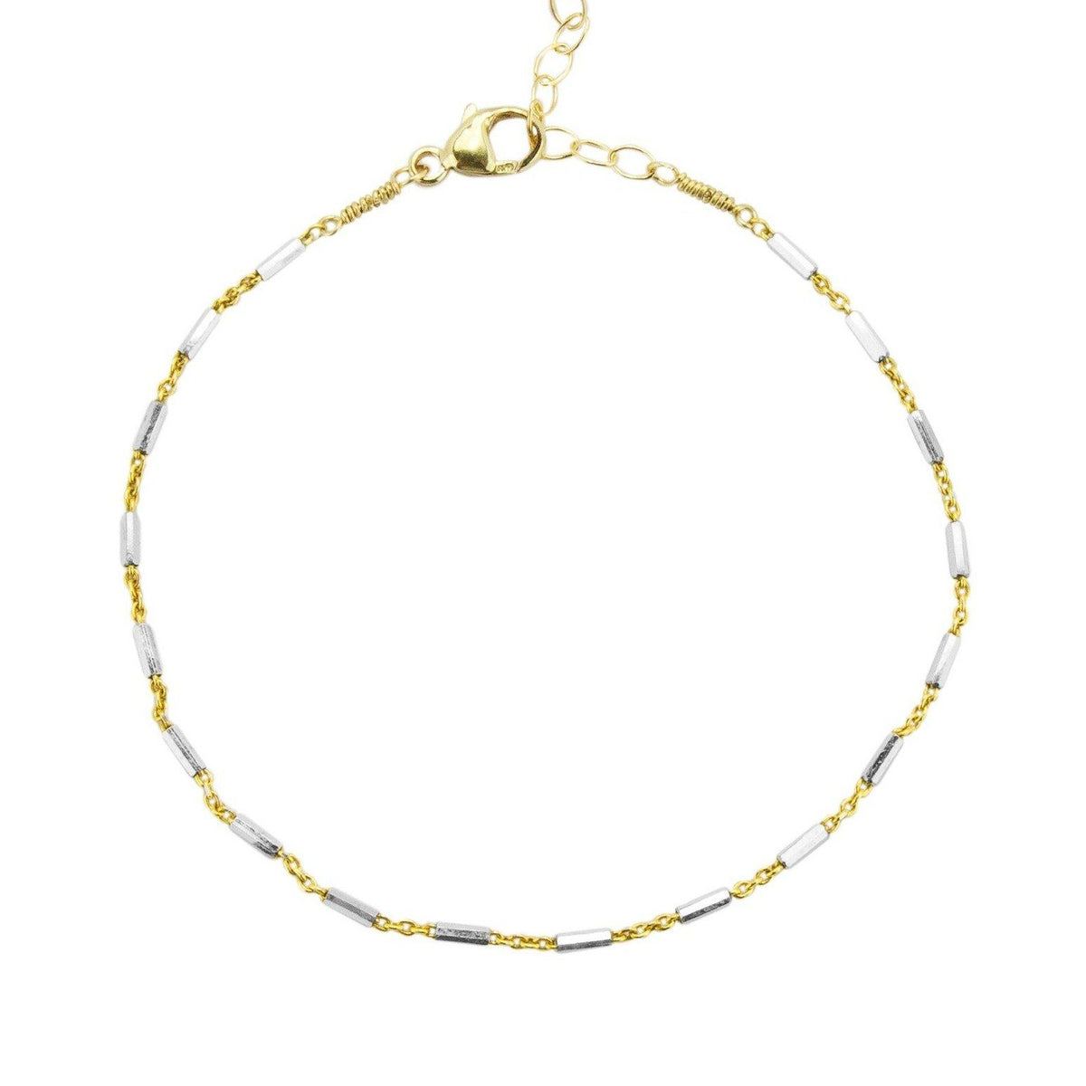 Silver and Gold link chain bracelet handmade by Katie Dean Jewelry shown on a white background.