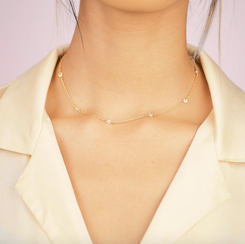The Crystal Chain Choker Necklace is perfect for the woman who wants a classic sparkle layered in with their look. 